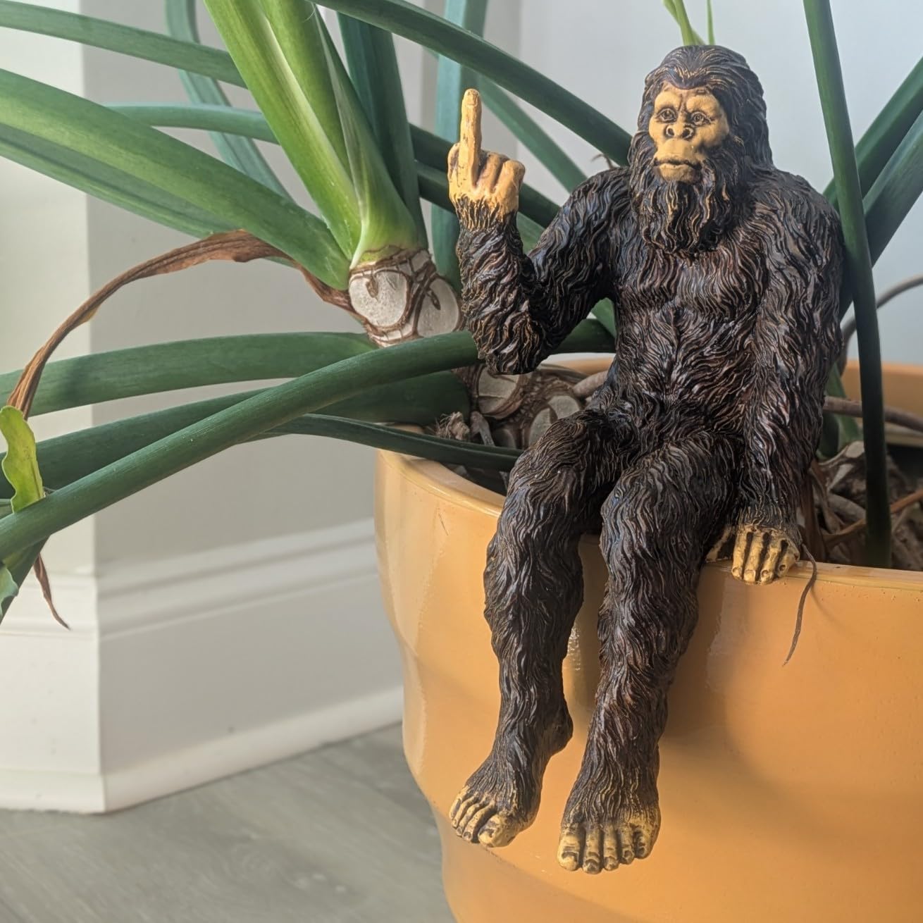 John Bernard & Company Bigfoot The Rude ‘Flipping The Bird’ Sasquatch Yeti Statue/Figurine Indoor/Outdoor Sculpture for Patio, Deck, Home, Office 10 in H Shelf Sitter Figurine (Natural)