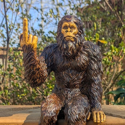 John Bernard & Company Bigfoot The Rude ‘Flipping The Bird’ Sasquatch Yeti Statue/Figurine Indoor/Outdoor Sculpture for Patio, Deck, Home, Office 10 in H Shelf Sitter Figurine (Natural)