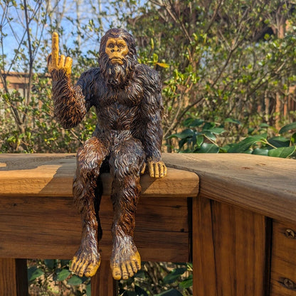 John Bernard & Company Bigfoot The Rude ‘Flipping The Bird’ Sasquatch Yeti Statue/Figurine Indoor/Outdoor Sculpture for Patio, Deck, Home, Office 10 in H Shelf Sitter Figurine (Natural)