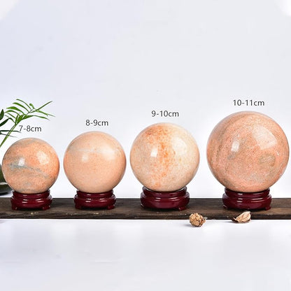 JIC Gem Natural Sunstone Sphere Ball with Wooden Stand for Fengshui Rare Healing Crystal Ball Decoation Meditation Energy Reiki Ball (90-100mm)