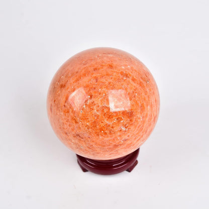 JIC Gem Natural Sunstone Sphere Ball with Wooden Stand for Fengshui Rare Healing Crystal Decoation Meditation Energy Reiki (90-100mm)