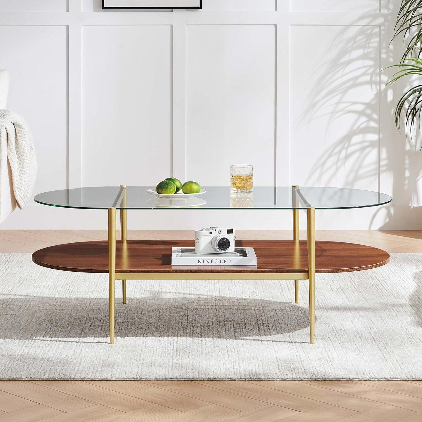 X-Large Oval Glass Coffee Table, Mid-Century Modern Design, L47 x W24 x H17 inch, for Living Room, Clear Glass Top and Walnut Finish Wood Shelf, Conical Legs with Gold Finish Frame